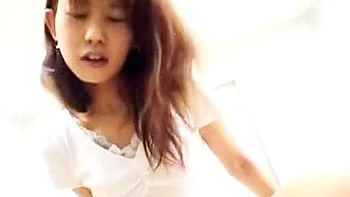 She inserts and removes the vibrator, gives a blowjob, and shakes her hips in the cowgirl position.