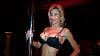 Bimbo Barbi shakes big tits at the strip club before fucking