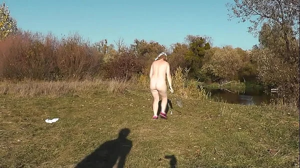 Wild beach. Nude in public. Outdoor on bank of river naked sexy mom MILF Frina learns to play badminton together with her naked lover. Outside. Nudist beach. Pussy natural tits ass Milf