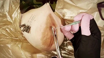 Mature Dominatrix Mistress April Rough Piercing Clinic - Extreme BDSM & Nipple Needle Humiliation