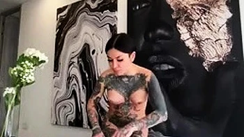 Brunette Babe Fucks Solo In Shiny Latex Dress