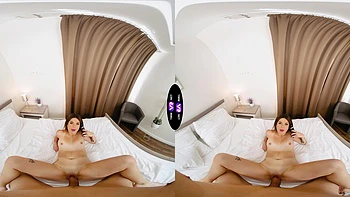 Two sexy babes ride a huge cock in VR