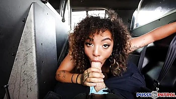 Ebony teen rides big cock in cop's backseat