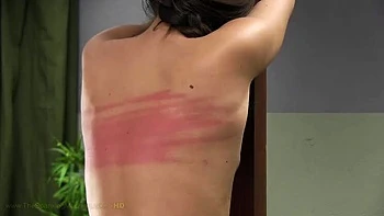 Brunette Teen Naked and Spanked in Prison by Machine