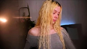 Curly blonde teen masturbates solo with dildo