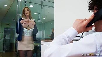 Redhead MILF Gets Double Blowjob and Handjob in Office