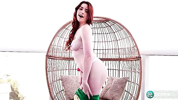 Skinny redhead Aria Carson strips and fingers herself