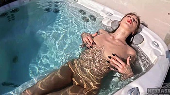 Brunette babe Lila goes wild in public, stroking her wet slit by the pool